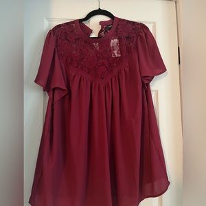 Float torrid cranberry colored blouse